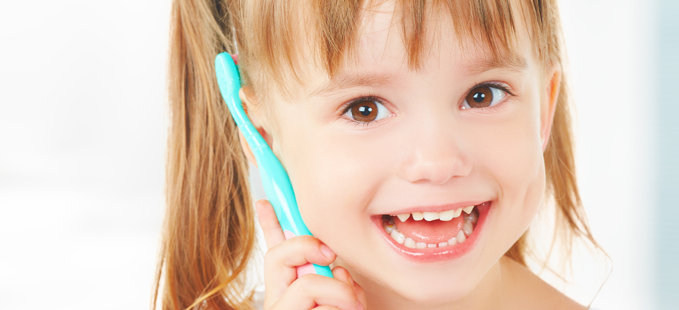Niña sin Fluor o Manchas en sus Dientes